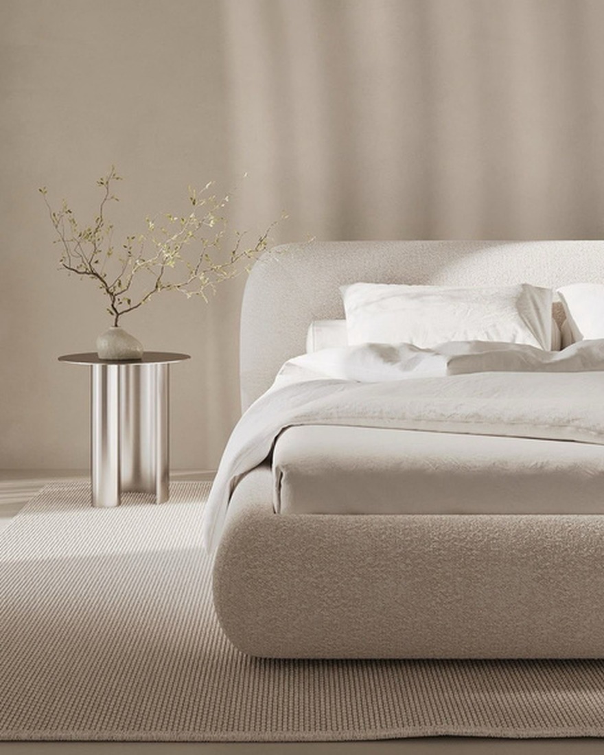 Neutral bedroom with upholstered headboard