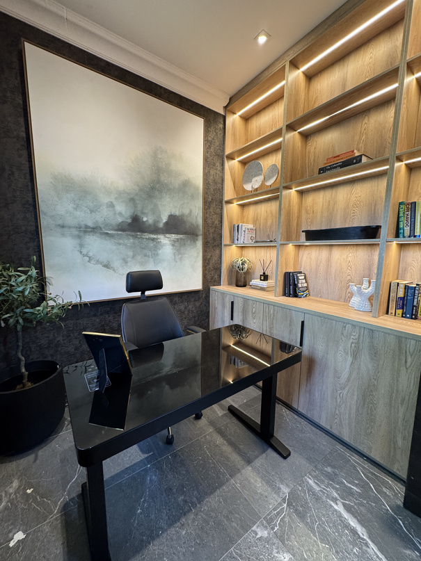 Home office with timber shelving and mural