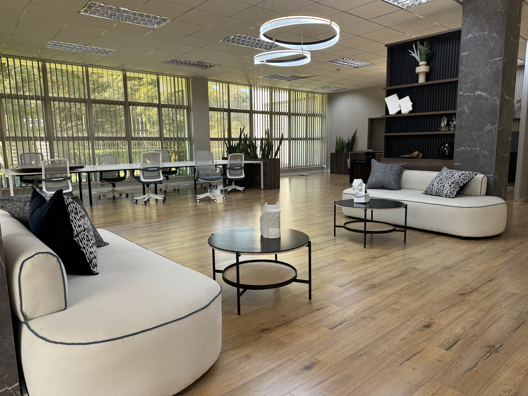 Office lounge with curved sofas