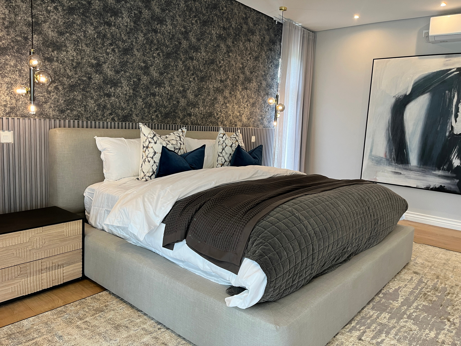 Bedroom with textured feature wall