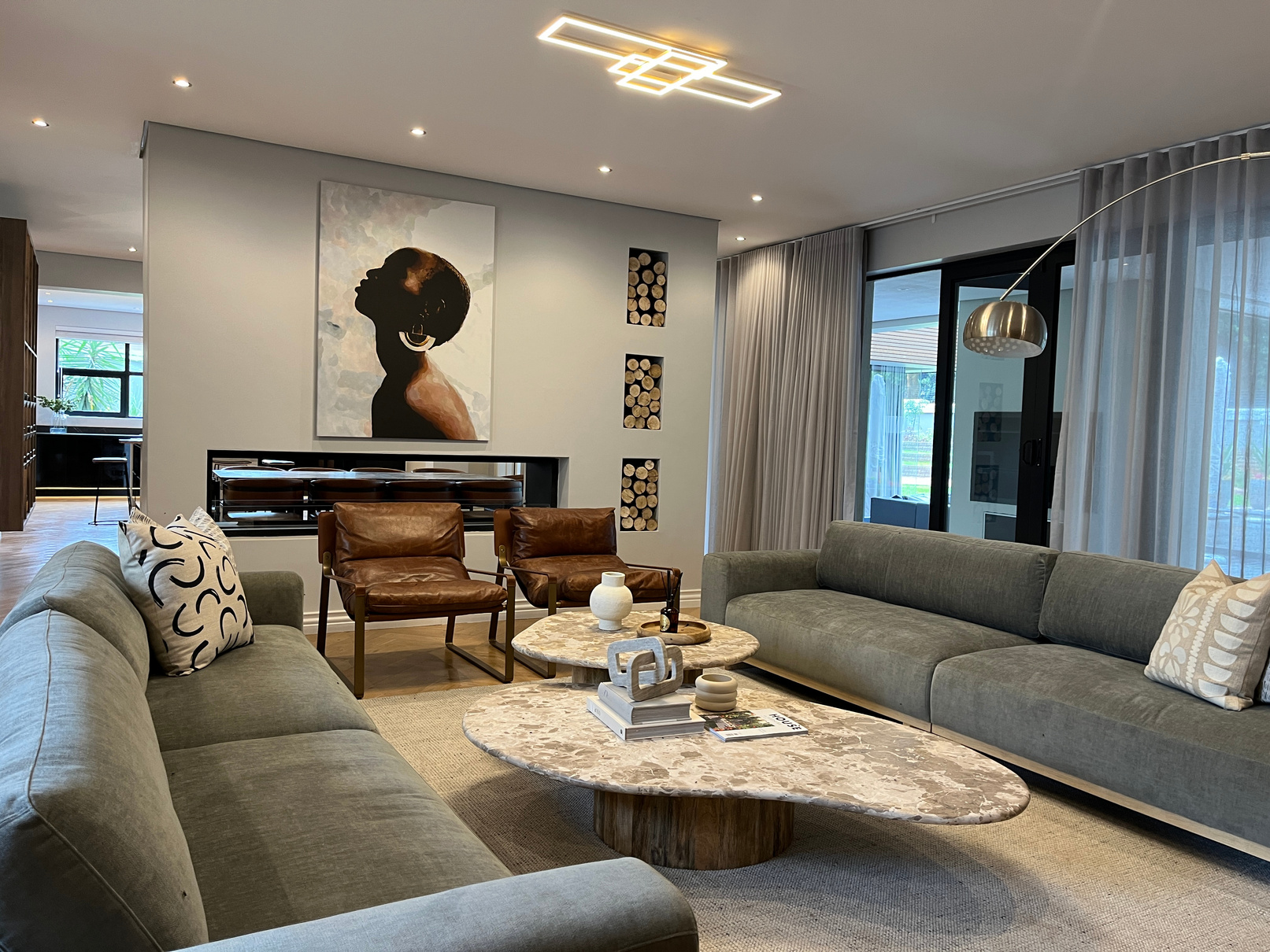 Sitting room with arc lamp and chaise sofa